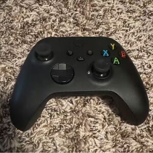 Sleek Black Wireless Gaming Controller